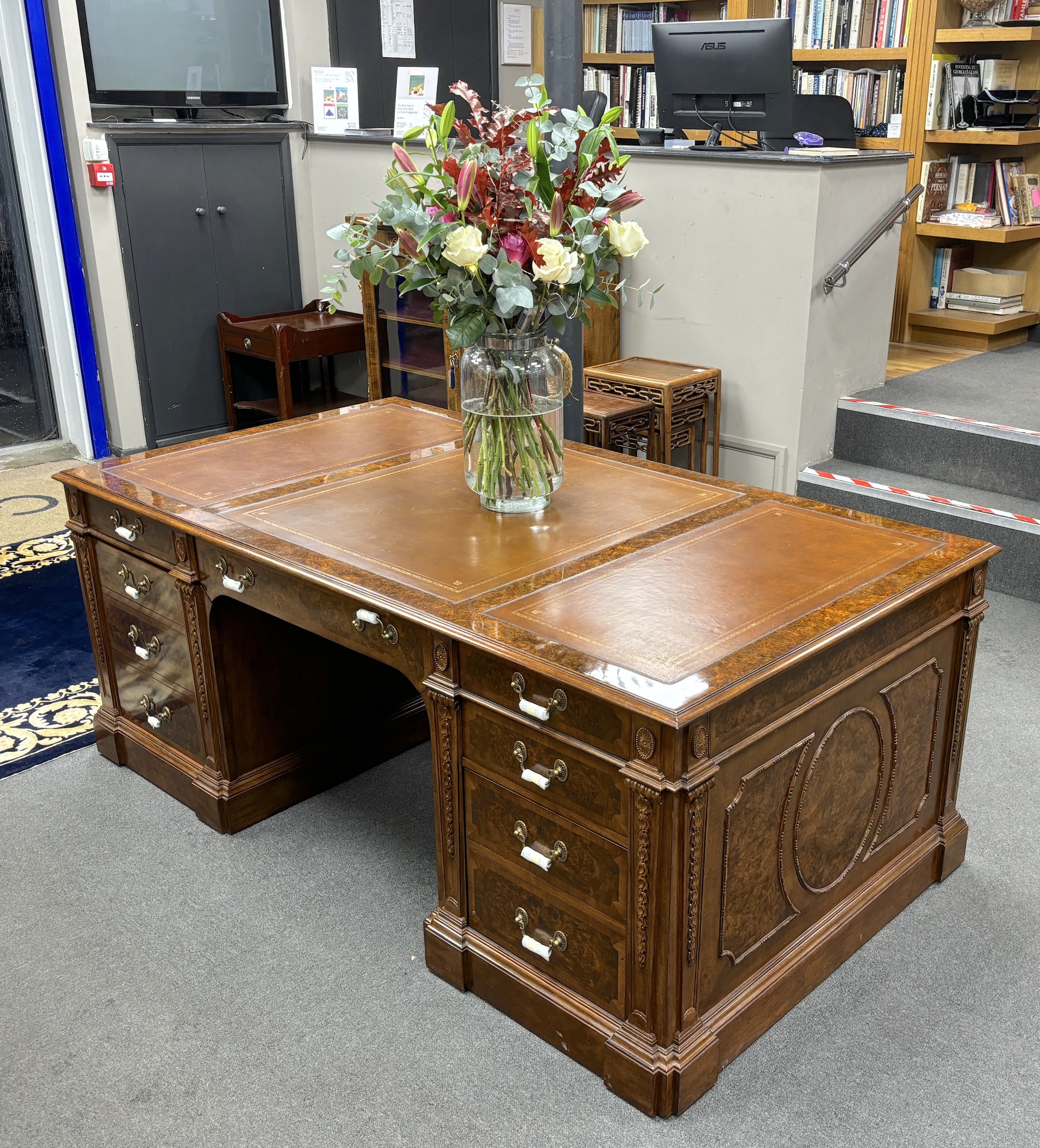 A George III style burr walnut pedestal partner's desk, width 193cm, depth 107cm, height 76cm